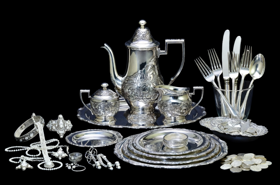 Sterling silverware and tea sets